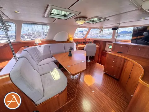 Adventure Antares listing photo showing salon port looking starboard 2.