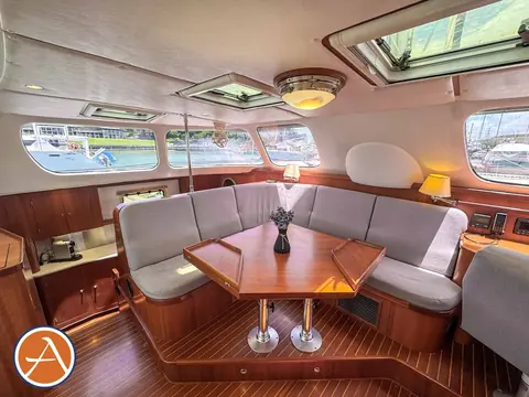 Adventure Antares listing photo showing salong table wings up.