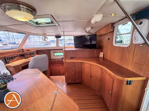 Adventure Antares listing photo showing salon aft view.