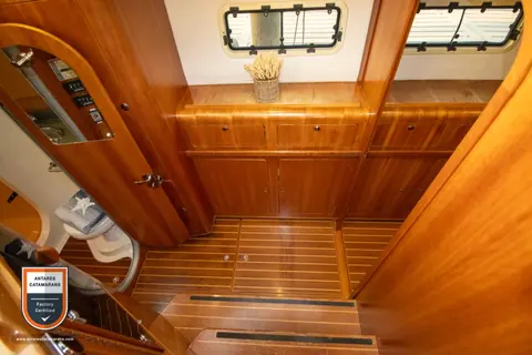 Amazing Grace Antares listing photo showing starboard stairs.