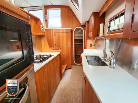 Cinnamon Antares listing photo showing galley aft.