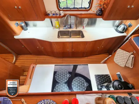 Cloud Nine Antares listing photo showing galley looking down.
