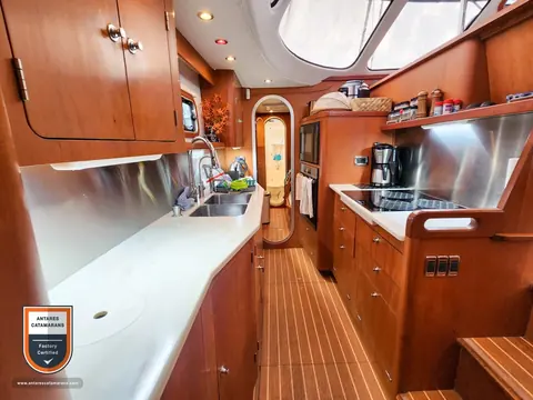 Cloud Nine Antares listing photo showing galley looking forward.