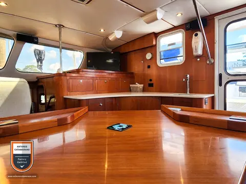Frolic Antares listing photo showing salon table looking aft 1.