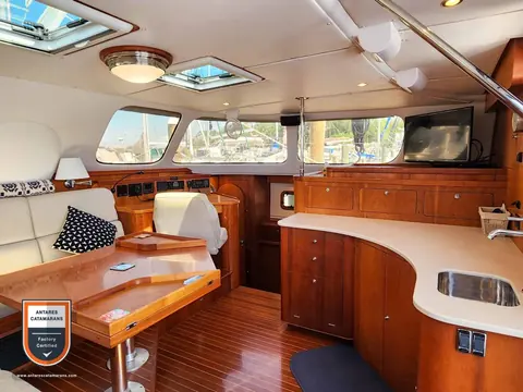 Frolic Antares listing photo showing salon port forward 1.