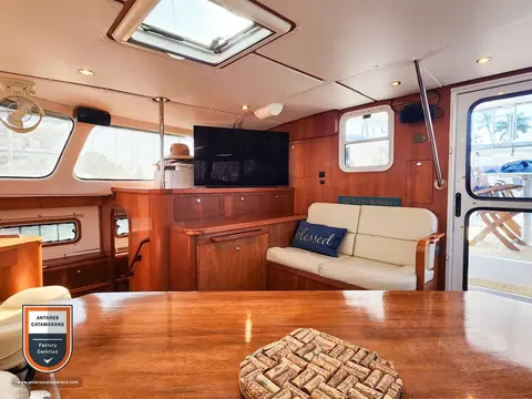Halo Antares listing photo showing salon table aft.
