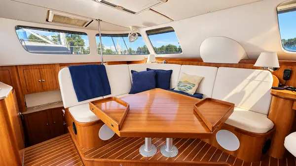Leap of Faith Antares listing photo showing salon wide.
