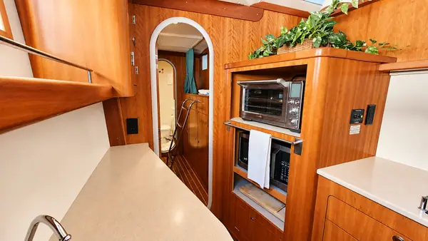 Leap of Faith Antares listing photo showing galley aft.