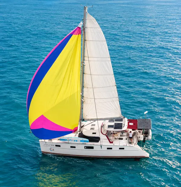 Leap of Faith Antares listing photo showing port spinnaker.