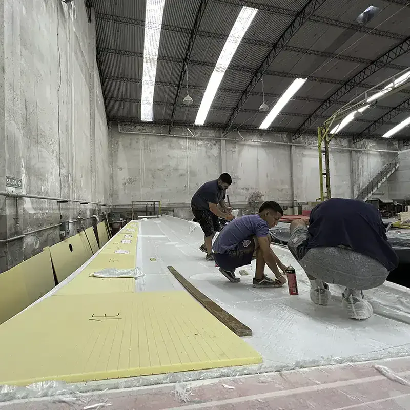 Antares catamaran hull layup preparation in the build facility