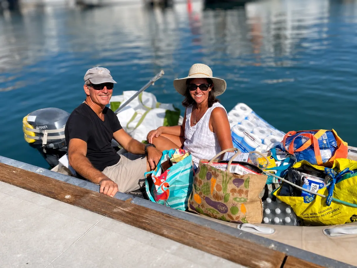 Dinghy alongside during everyday life aboard an Antares catamaran