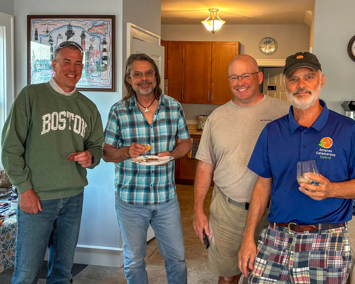 Smiling Antares owners and support team gathered aboard