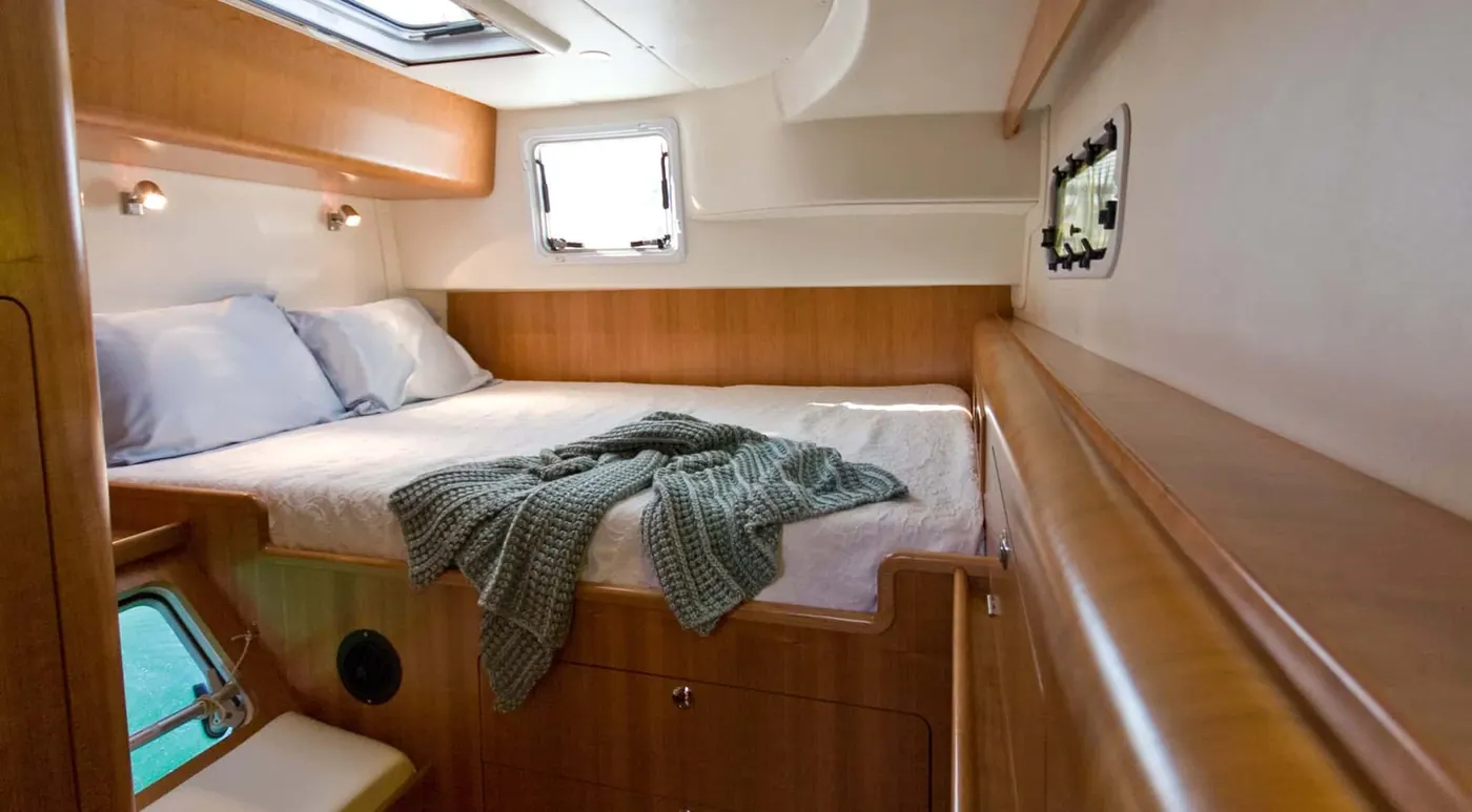 Antares 44 GS guest cabin with double berth and cherry joinery