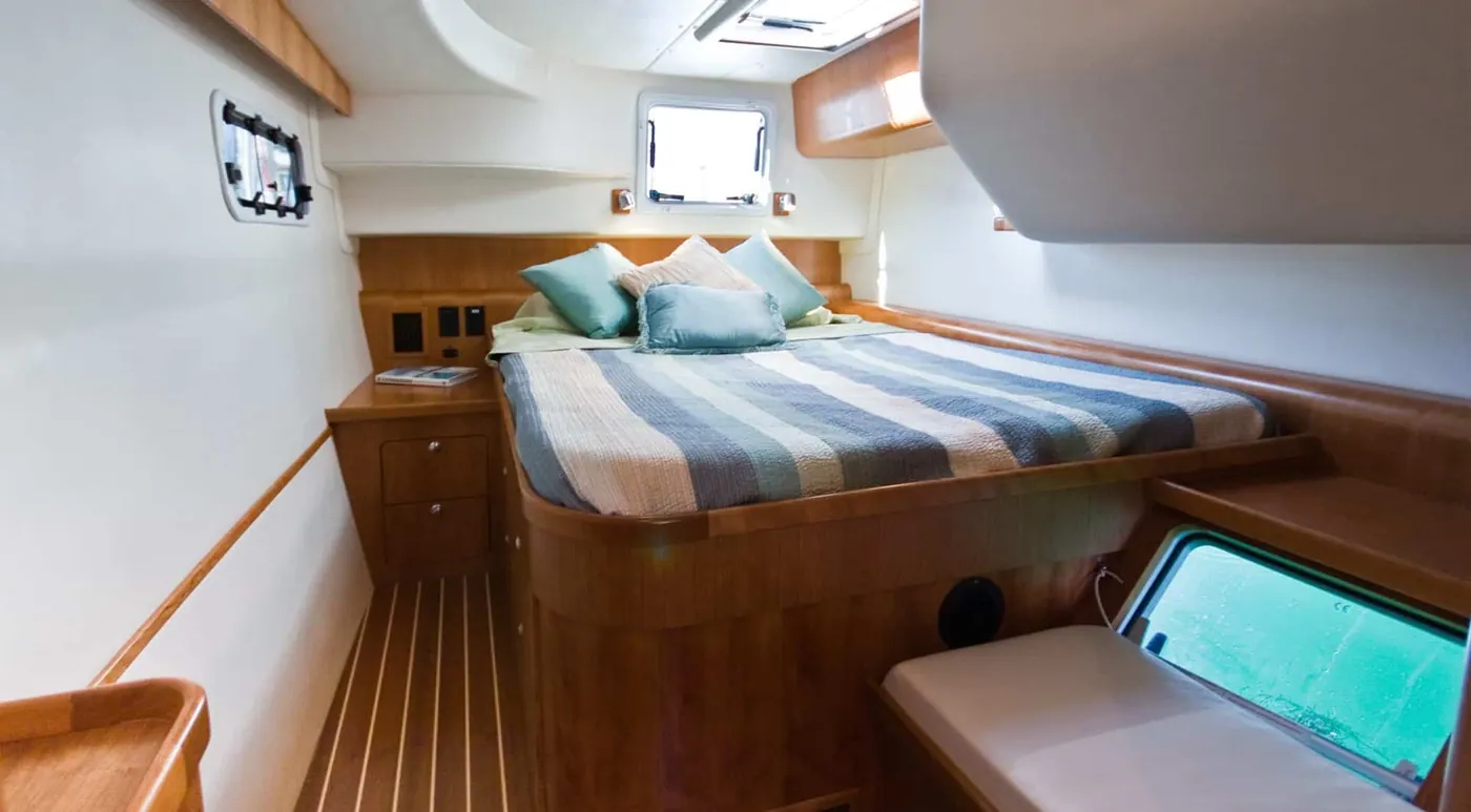 Antares 44 GS master cabin with double berth, storage and hull window