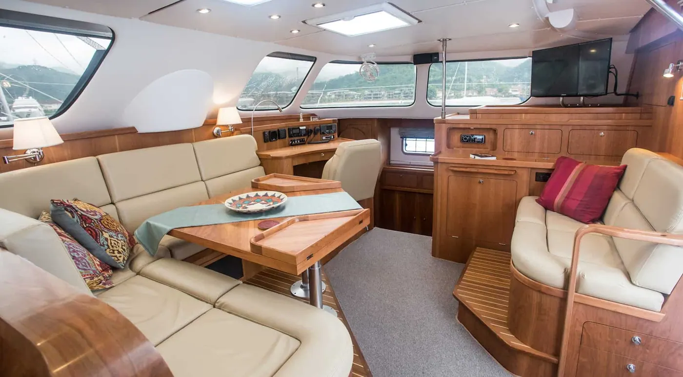 Antares 44 GS saloon with additional seating and warm cherry joinery
