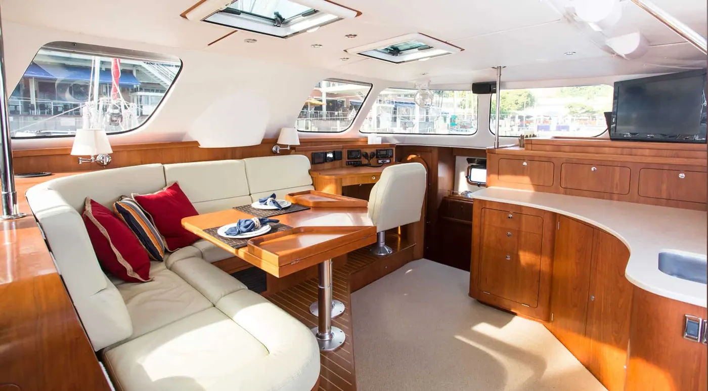 Antares 44 GS standard saloon with cream seating and cherry cabinetry