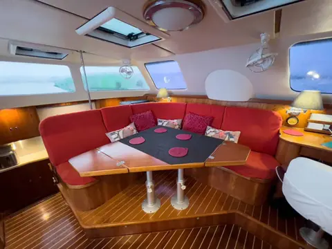 Whatabout Antares listing photo showing salon settee scaled.