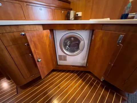 Whatabout Antares listing photo showing washer dryer scaled.