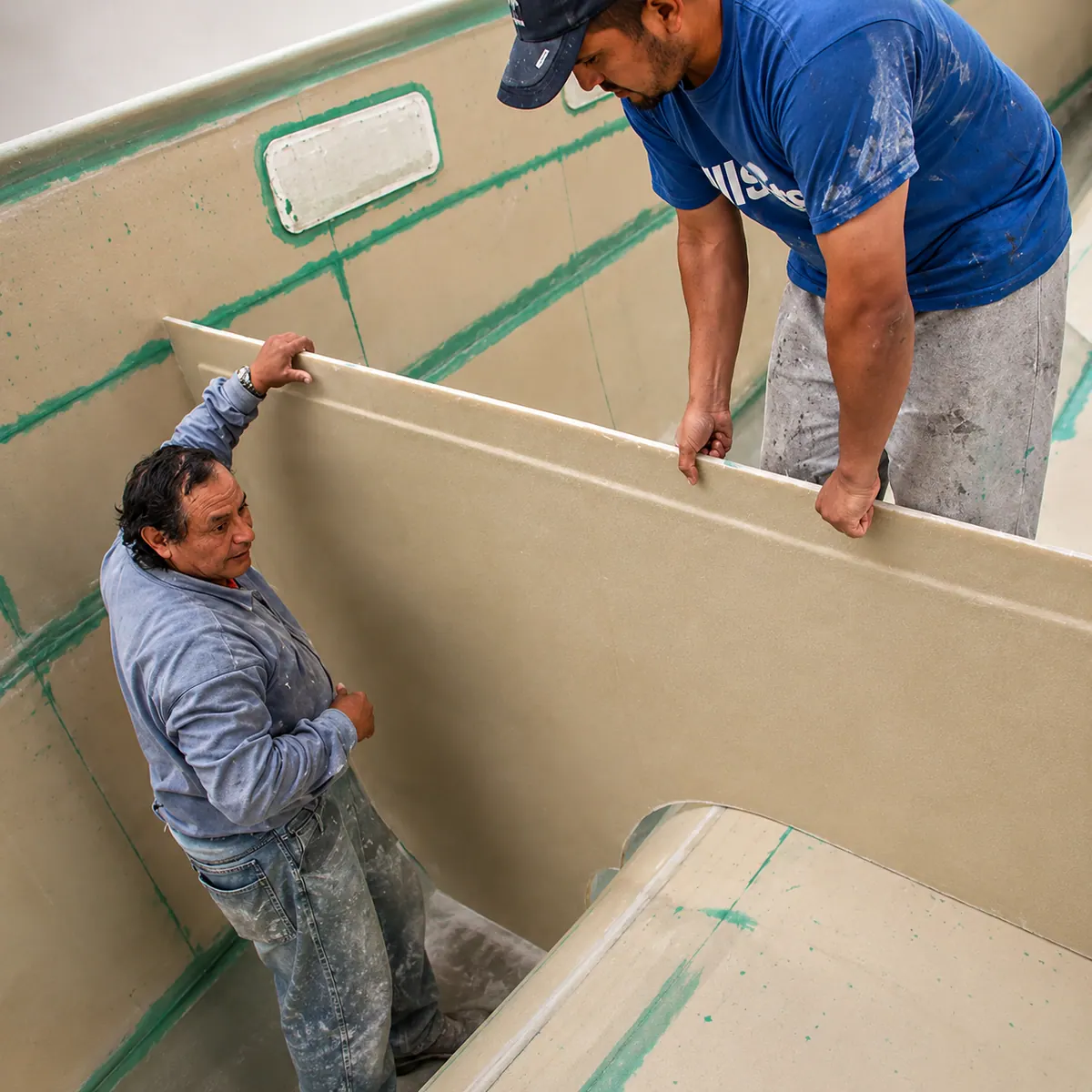 Antares bulkhead integration during construction with panels bonded into the hull
