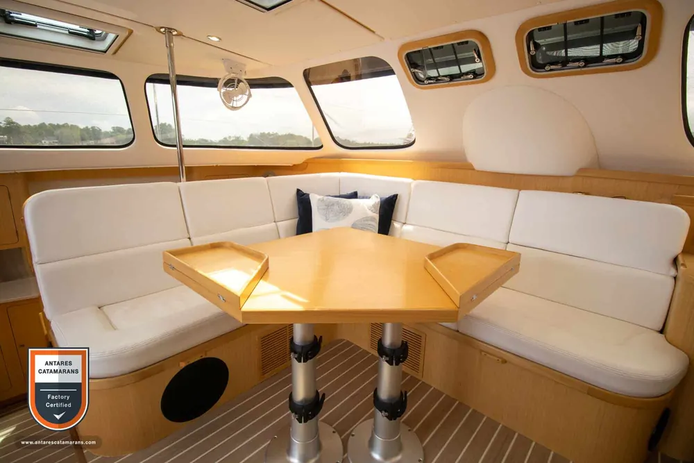 Zephyr Antares listing photo showing salon table.