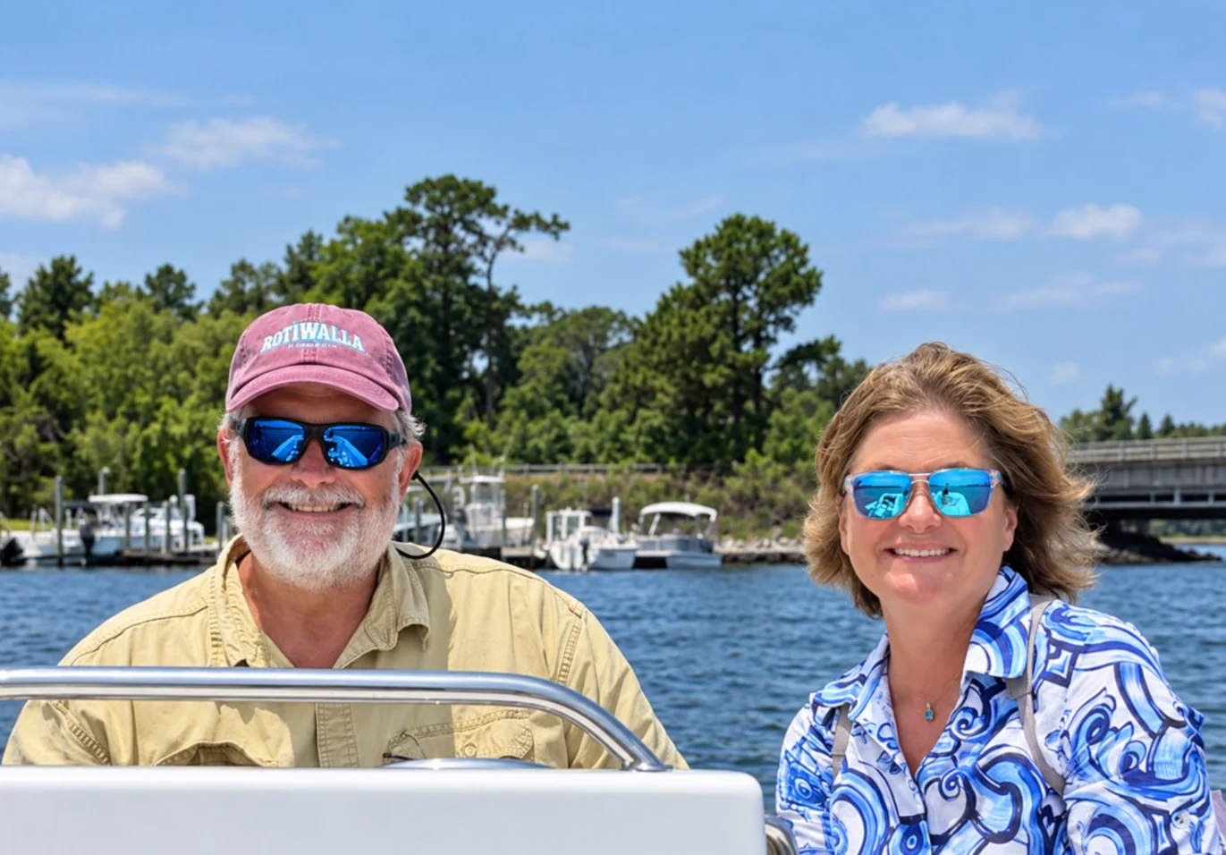 Zephyr owners smiling aboard a boat