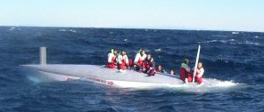 monohull racing sailboat capsize
